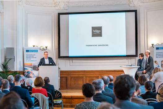 Foto Veranstaltungssaal mit Vortragendem von Vossen GmbH